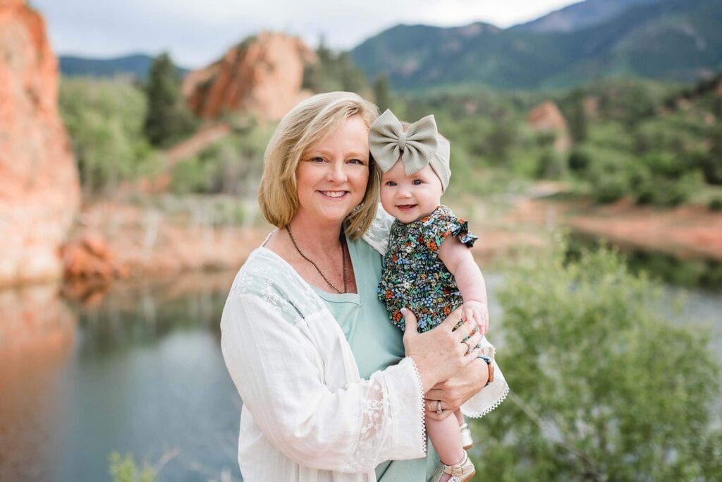 portrait of mother and daughter on family vacation in colorado springs, taken at garden of the gods scenic tourist spot