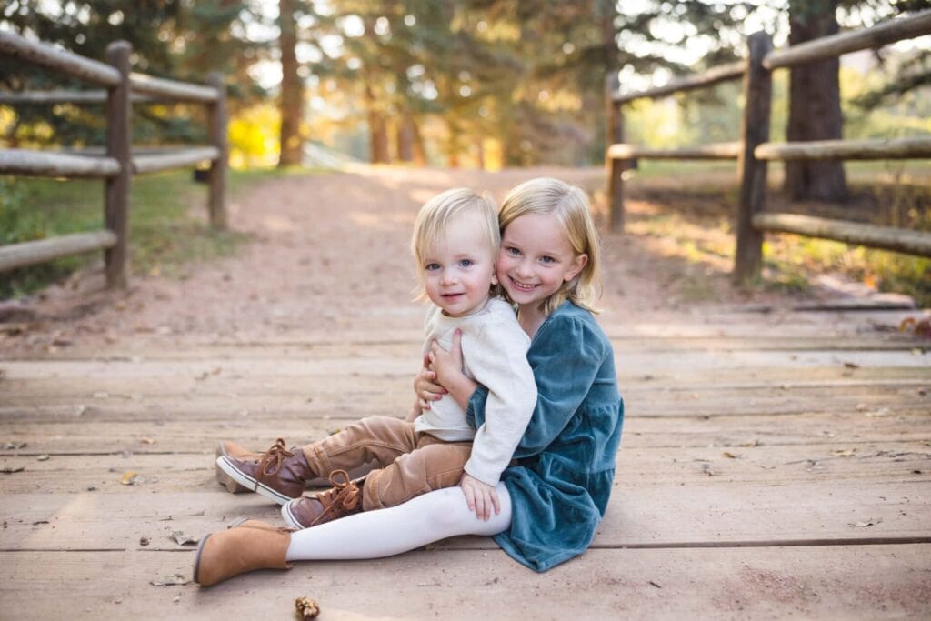 why sunrise and sunset for outdoor photos, little girl hugging brother