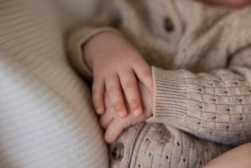 Closeup of baby's hands captured by Peyton, Colorado newborn photographer