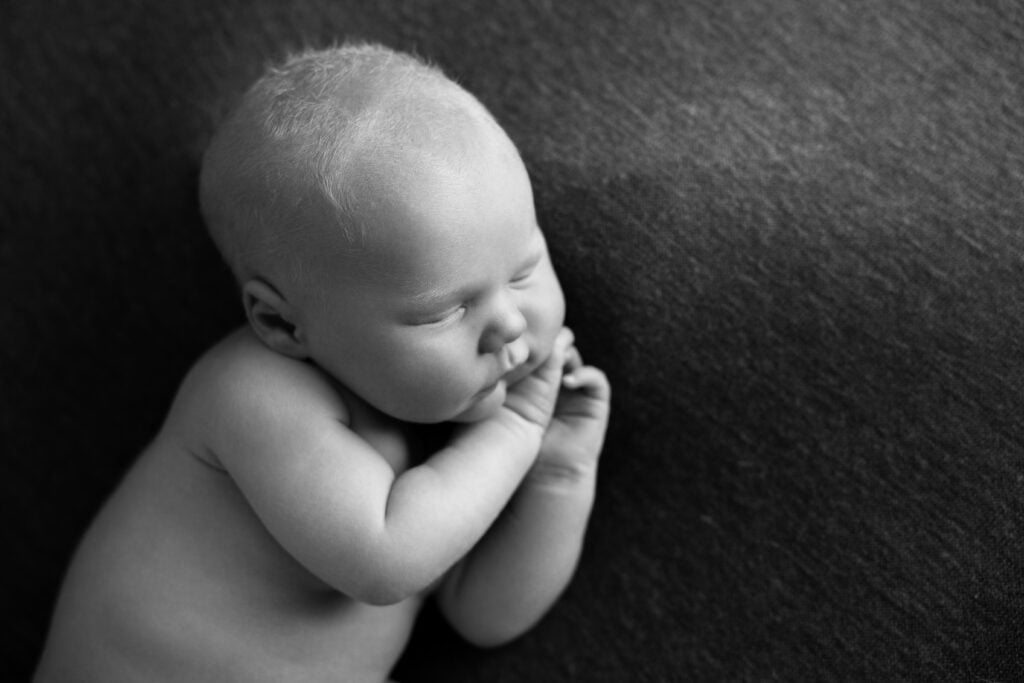 in-home newborn photos of baby boy in Monument Colorado